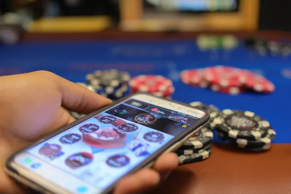 A confident dealer surrounded by casino chips inviting players to access their 1XBEF account, reflecting quick and easy login options.